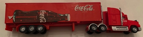10312-1 € 10,00 coca cola vrachtwagen afb liggende fles ca 26 cm.jpeg